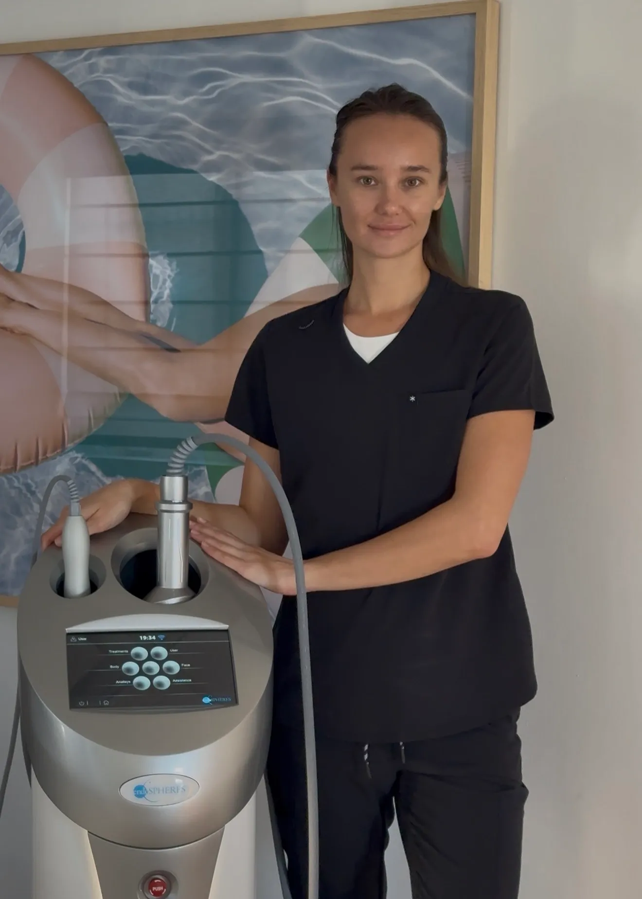 Viktoria Miede, founder of REVIKA, beside the Endospheres treatment device